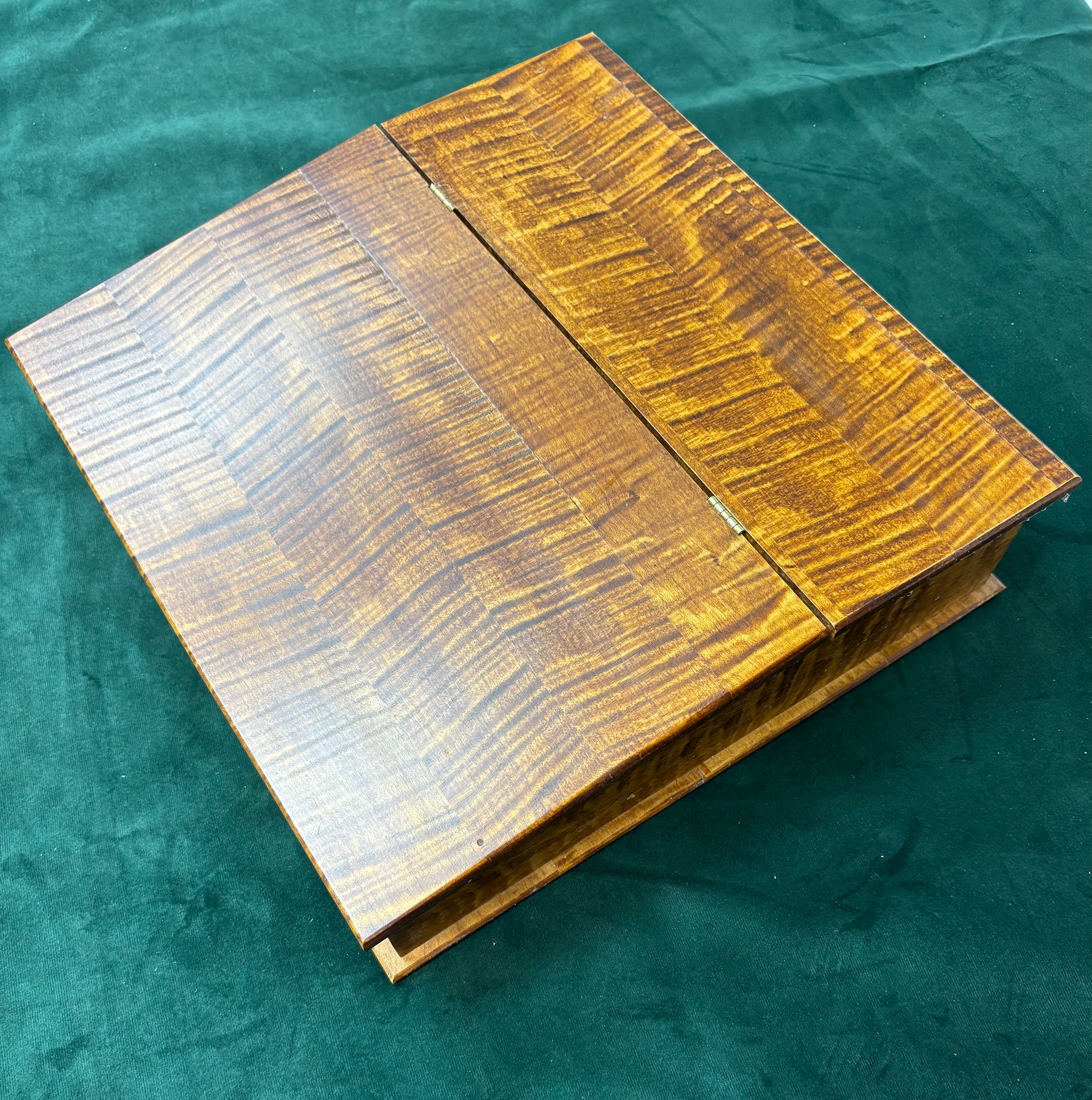 Writing desk angle showing curly maple grain